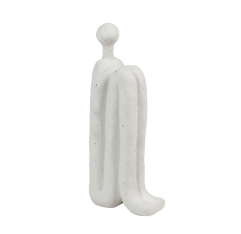 white stoneware sculpture of a person