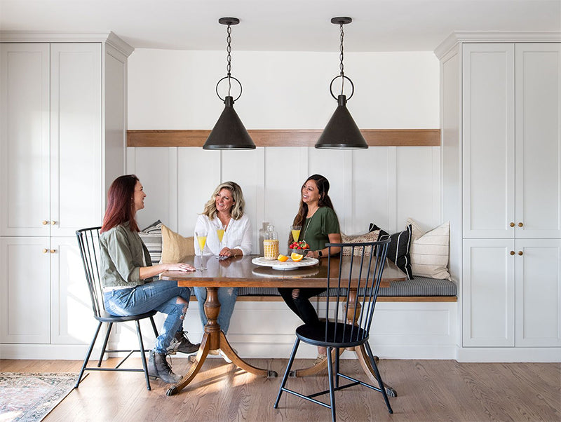 3 lades talking in beautiful modern farmhouse kitchen