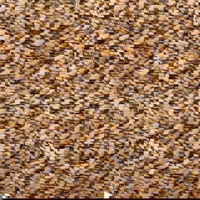 Close-up of braided banana leaf with brown and beige colors