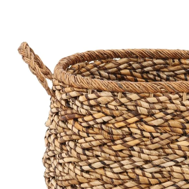 Woven basket with natural brown tones on a white background
