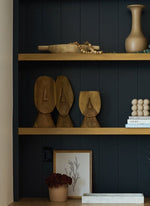 built-in shelving with beautiful wooden and terracotta decor 
