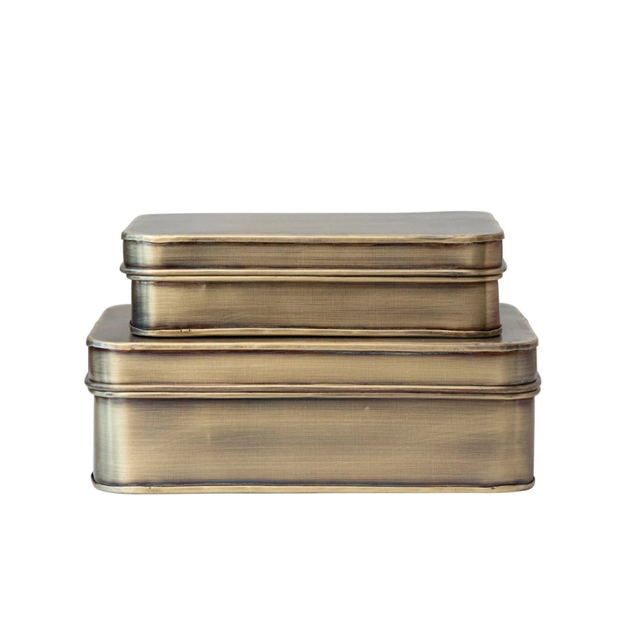 A set of two nested rectangular metal tins with rounded corners in an antique brass or bronze finish, shown against a plain white background.