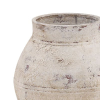 Vintage-style ceramic pot with a textured surface on a white background