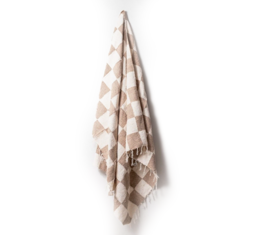 checkered, sustainable , handmade throw blanket in cream and tan with tassels 