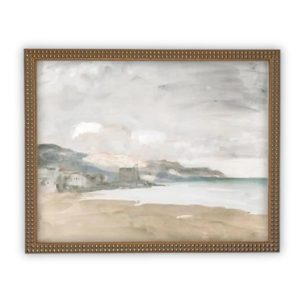 Framed artwork of a coastal scene with a few buildings on a hill.