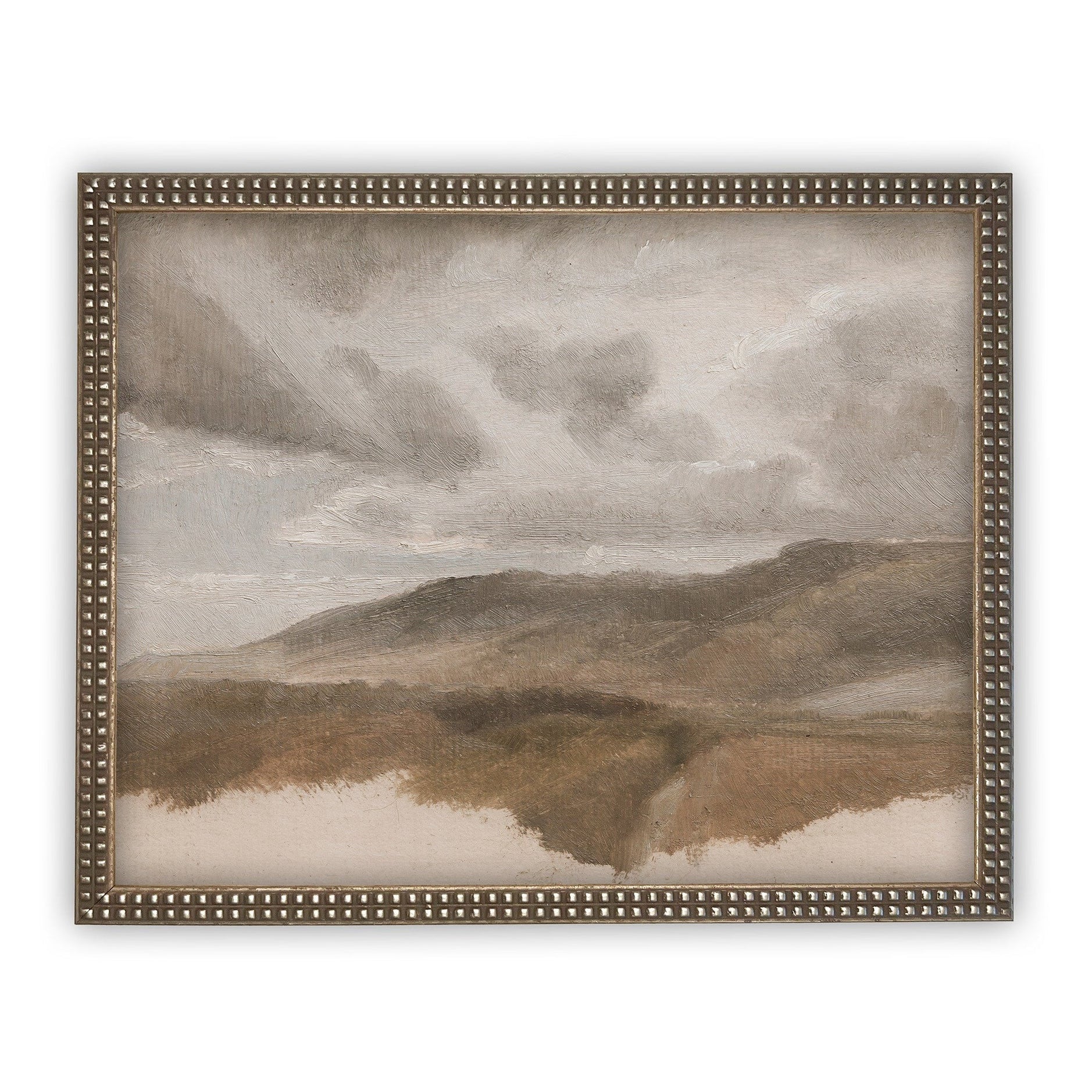 Framed landscape painting of a misty mountain scene with sand dunes.