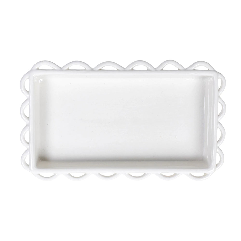 Rectangular white tray with scalloped edge on a white background