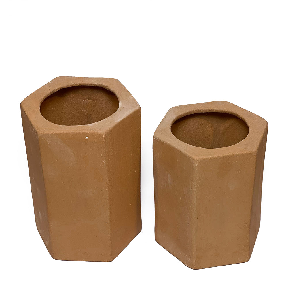 Two hexagonal, terracotta vases