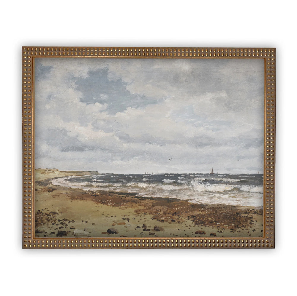 Framed painting of a coastal landscape with waves and sky.