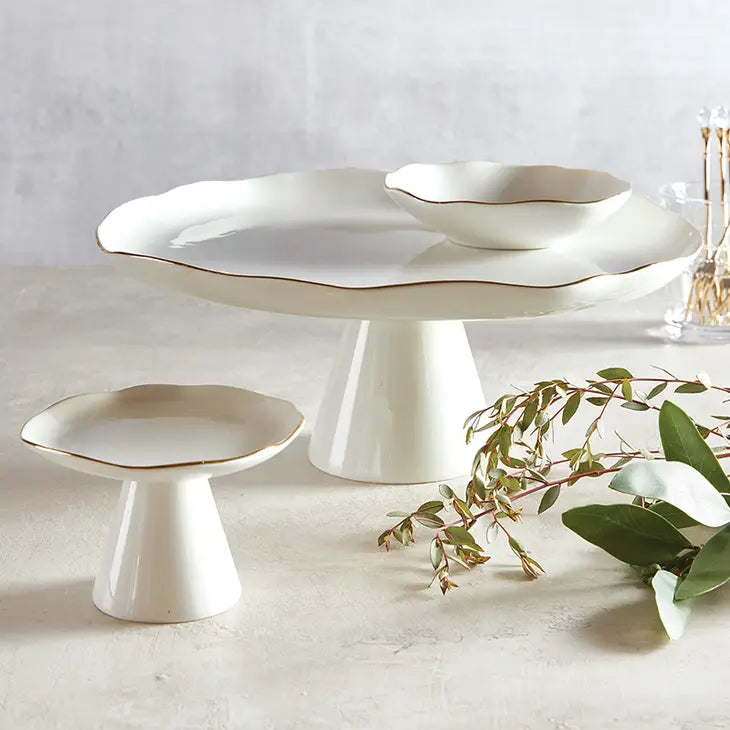 2 white cae stands and matching small bowl all with organic wavy edge