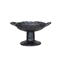 Black stone bowl on a white background