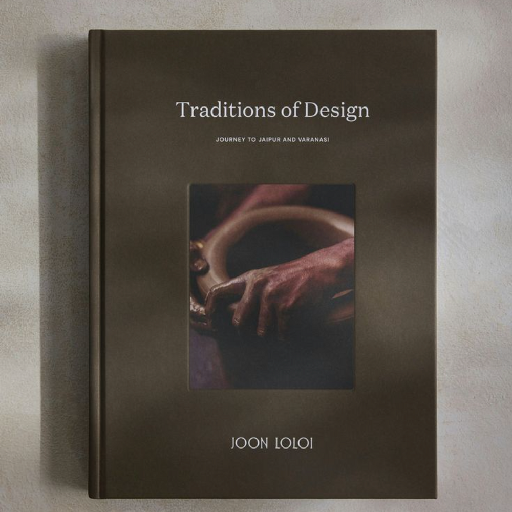 Book cover titled "Traditions of Design" by Joon Loloi, featuring a photo of hands shaping clay. It conveys an artistic and cultural theme.