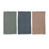 Three rectangular fabric samples in green, blue, and brown on a white background
