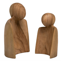 A wooden sculpture set of a larger and smaller human-looking  figure 